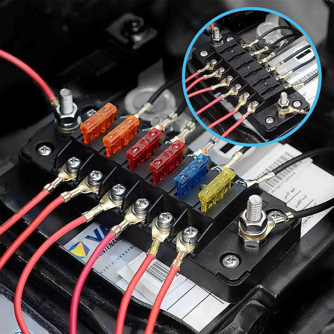 Rock Solid Six Way Fuse Block With Ground Rail Blade Fuse Panel For 12V And 24V Rides; close-up view showing connections and fuses.