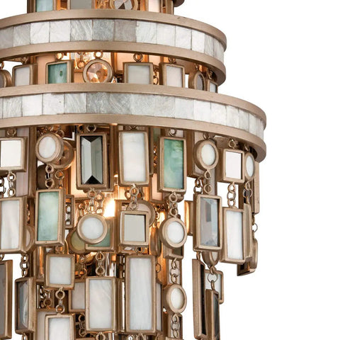 Close-up of Top Shelf Three Light Wall Sconce Hand Crafted From Solid Iron Showcasing Sharp Crystal and Stainless Accents.