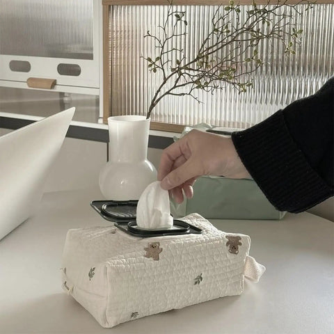 Hand taking wipe from Compact Wet Wipe Organizer For Diapers And On The Go Essentials Lightweight Reusable Travel Case