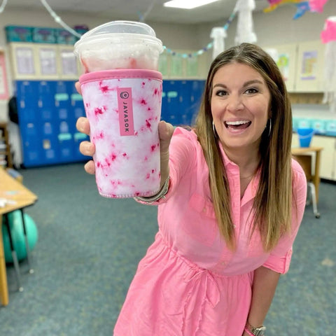 Premium Neoprene Iced Coffee Sleeve Keeps Your Daily Grind Crisp And Chill With Tough Fabric Coated Material and Reinforced Seams for 22-28 oz cup.