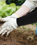 Dang Tough Cut Resistant Arm Sleeves For Gardeners And Carpenters With Elastic Wrist Guard Heat Resistant Safety Gear keeping forearm protected while digging in soil.