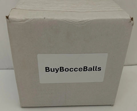 Cardboard box labeled 'BuyBocceBalls' on a white surface.