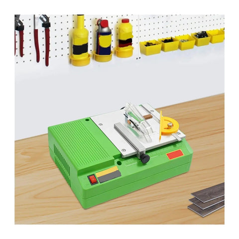 Compact 480W Mini Table Saw Featuring A Knockout Motor And Hella Smooth Wood Panel Slicing Lightweight Portable Electric Cutting Tool on a wood surface.