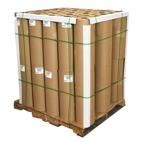 Badass Pallet Edge Protectors Corner Guards 2X2X60 Inch white paper board stabilizers on a pallet of rolled cargo.
