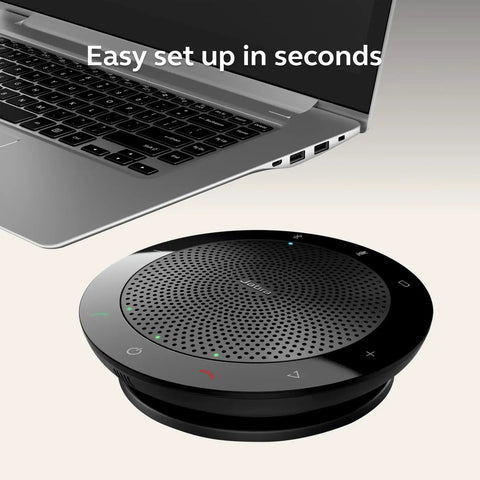 Speak 510 Portable Conference Speaker For Meetings And Calls With Rock Solid Sound USB Or Bluetooth Wireless Connectivity beside a laptop