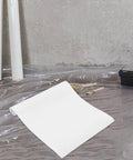 Slick Clear Peel And Stick Wallpaper For Kitchen Countertops And Bathroom Vanities Waterproof Self Adhesive Contact Paper Removable Cabinet Wrap One Roll on a surface with tools.