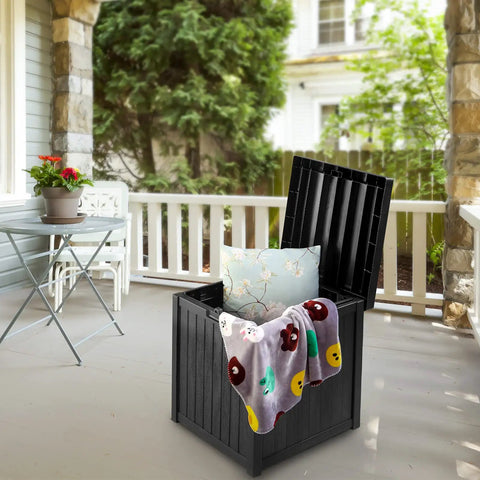 52 Gallon Outdoor Storage Box Deck Box Weatherproof Bench Black That Doubles as Extra Seating Waterproof Patio Chest Heavy Duty 440 Lb Capacity For Patio Use; open on a porch with cushions inside.