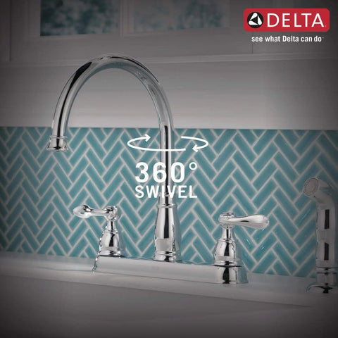 Windemere Chrome Kitchen Faucet with side sprayer, four-hole 8-inch center, two-handle, classic design, in use.