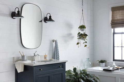 Modern bathroom with Elmhurst No Fuss Single Handle Bath Faucet Chrome Finish For 1 Or 3 Hole 4 Inch Install, mirror, and plants.