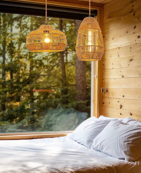 Hand Woven Rattan Pendant Light With Plug In Cord 15Ft Hemp Rope in cozy bedroom with wooden walls, warm glow visible
