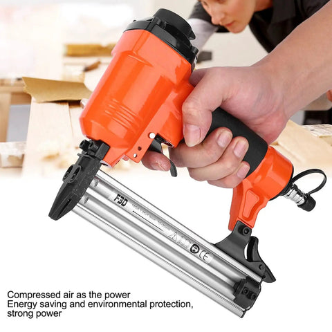 Top Shelf Industrial Pneumatic Brad Nailer With Bullyproof Steel Construction, orange handle, designed for quick nail firing.