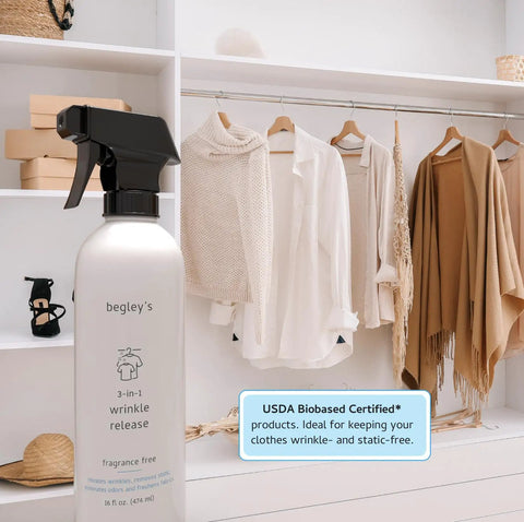 Straight Up Game Changer Travel Size Wrinkle Remover And Static Cling Eliminator With Fresh Linen Scent Quick Fix Odor Killer For Shirts And Pants Two Pack Eco Bio Based Formula in a stylish closet with draped clothing.
