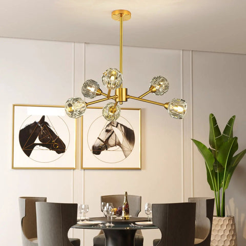 Gold Sputnik Crystal Chandelier, 6 Light Modern Dining Room Fixture Over Table with glam brass finish and spherical orbs