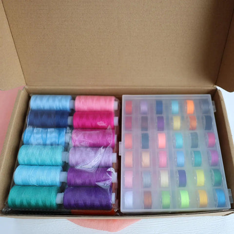 Top Shelf 72 Piece Sewing Thread Kit With 36 Vibrant Polyester Shades And Matching Bobbins showing assorted colorful spools in a box.