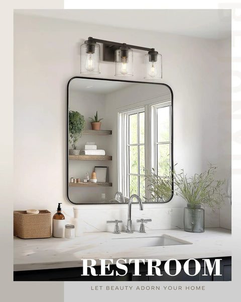 Bathroom scene with 3 Light Vintage Style Vanity Light Fixture for Bathrooms in Oil Rubbed Bronze With Clear Seeded Glass above mirror