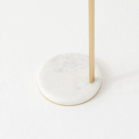 Luna Drop 75 Inch Antique Brass Floor Lamp With Frosted White Glass Globe Shade base detail on white surface