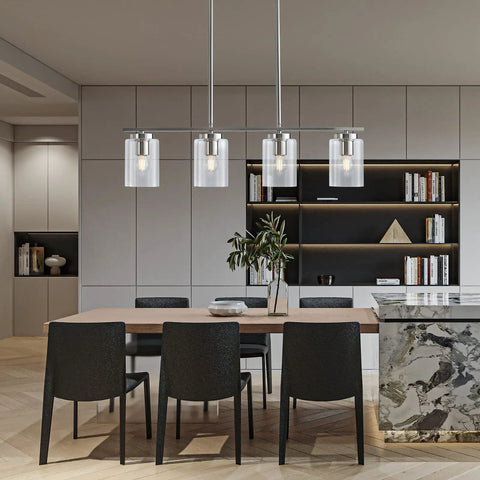 Elegant dining room with Four Light Brushed Nickel Island Pendant Lights With Clear Glass Shades For Kitchen Island glowing warmly.