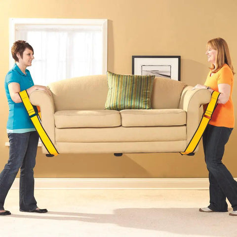 Two women using Badass Forearm Moving Straps to carry a couch, highlighting ease of transport and scratch-free flooring.