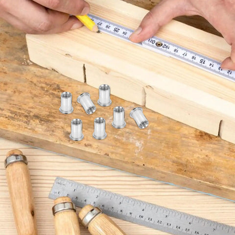 50 Pack M6 Knurled Stainless Steel Blind Rivet Nuts Set with tools on wooden surface for industrial applications