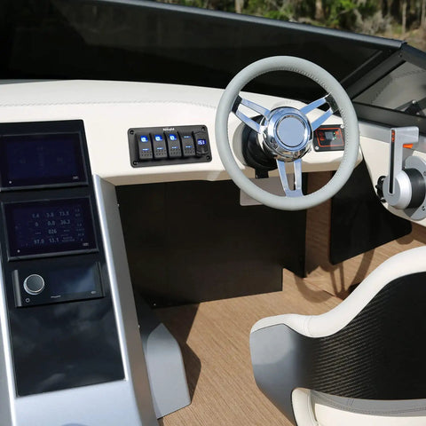 Boat dashboard with installed Waterproof DPDT 7 Pin Rocker Switch On Off On Toggle For 12V 24V Systems, easy access control panel