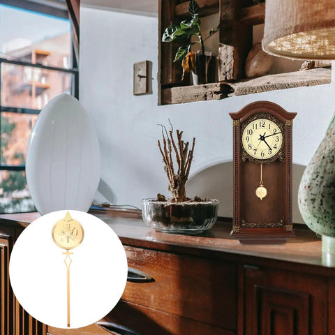 Durable Metal Pendulum Replacement For Wall Clocks And DIY Timepiece Projects on vintage wooden shelf