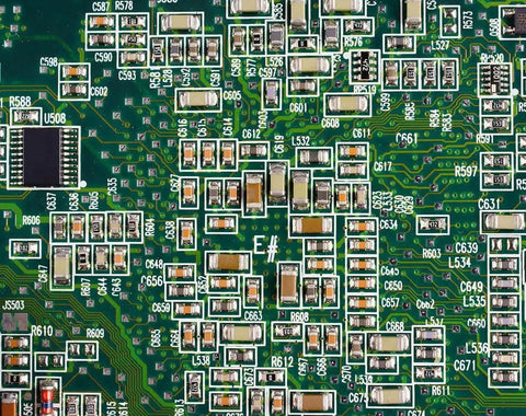 Close-up of a PCB featuring 0805 ceramic capacitors from the 1000 Pcs 0805 SMD Capacitor Kit No Brainer With 50 Values 1pF-10uF