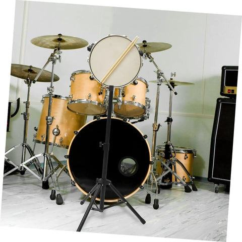 Hella Sturdy 12 Fold Snare Drum Stand Rack With Heavy Duty Accessory Holder For Practice Pads And Gear Compact Road Ready Top Shelf Black Finish with practice pad and drum set.