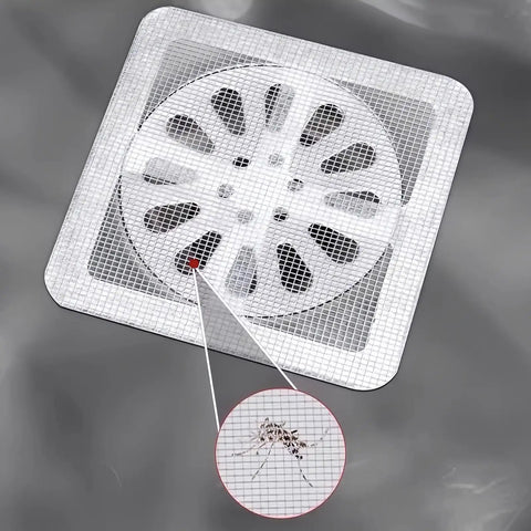 Top Shelf Fifty Pack Bundle Of Disposable Shower Drain Hair Catchers Plus Bathroom Sink Strainer Covers For Smooth Floor Drain Guard And Zero Clog Headaches Daily Home Game Changer showing a gray drain mat with hair catching design.