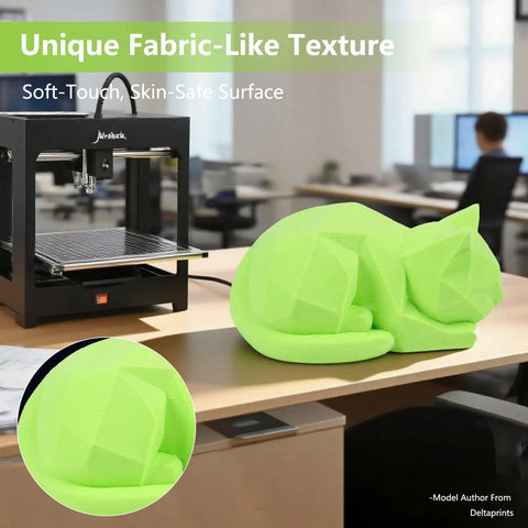 Premium Active Foaming TPU 3D Printer Filament In Bright Green With A One Kilogram Spool delivers a soft-touch cat sculpture with fabric-like texture.