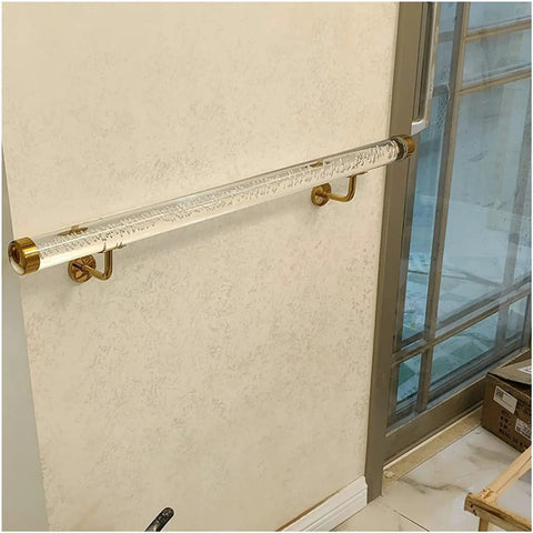 Clear Acrylic Railing Panels With Heavy Duty Silver Brackets Cut To Length From Half Meter On Up For Patios And Stairs Built Tough No Sweat Diy Assembly installed on wall with golden brackets