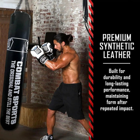 Built Different 100lb Heavy Bag With Killer Synthetic Leather Cover And Heavy Duty Hanging Chain For Secure Mounting in use, showcasing durability.