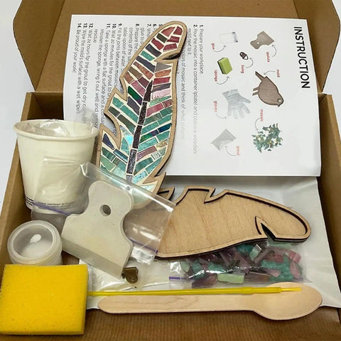 Box contents of DIY Mosaic Kit For Adults With Feather Bird Cat And Heart Designs including tools and instructions