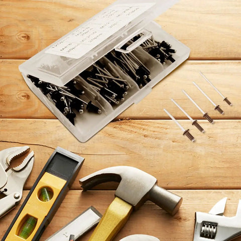 120 Pcs Black Aluminum Blind Rivets Kit With M2.4 M3.2 And M4 Sizes Burr Free Pull Rod Fasteners on a workbench with tools.