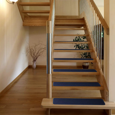Wooden stairs with Non Slip Carpet Stair Treads Set Of 15 Navy Blue 8x27 Inches Skid Resistant Rubber Backing for safe steps.
