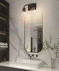Industrial Style Bathroom Vanity Lighting Fixtures Four Light Matte Black Finish with Clear Globe Glass in a modern bathroom