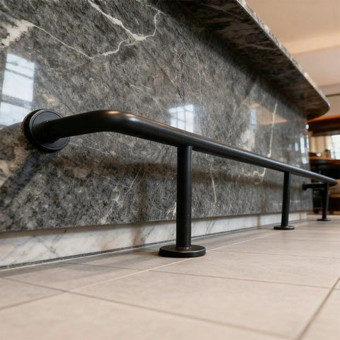 Bar Foot Rail Kit Stainless Steel Under Counter Mount Hardware With Foot Pedal, Black finish, installed along marble counter