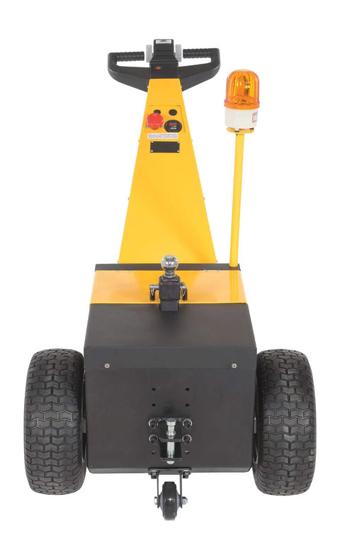 Heavy Duty Electric Powered Tugger With 5k Capacity Is Total Gas For Moving Heavy Trailers And Carts At Airports, rear view showing controls and wheels.