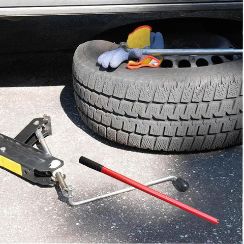 Heavy Duty Hydraulic Jack Handle For Car Suv Van 12 To 16 Ton Capacity positioned near a tire with gloves and tools.