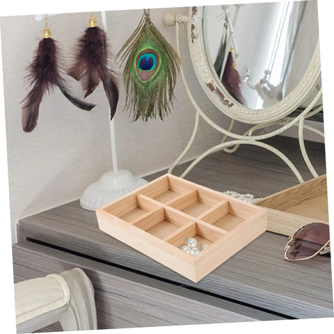 Six Compartment Wood Jewelry Tray With Multi Grid Layout For Rings And Bracelets Rustic Countertop Trinket Dish on a wooden surface.