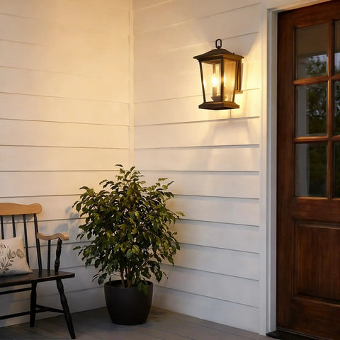 Rugged Outdoor Wall Lantern For Porches And Patios, Weatherproof Aluminum Sconce With Clear Glass Shade, lit by door