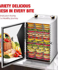Heavy Duty Commercial Food Dehydrator 18 Trays Stainless Steel Snack Dryer with fruit on racks and open door.