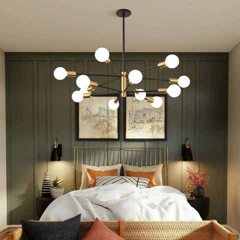 Modern 12 Light Sputnik Chandelier in Black and Gold for Dining Room Over Table, Mid Century Style Vibe, showcased in bedroom setup.