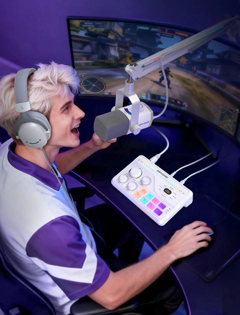 Person using Gaming Audio Mixer With 7 Point 1 Surround Sound, Volume Knob And Mute For Crisp Voice Chat, RGB USB Computer Mixer.