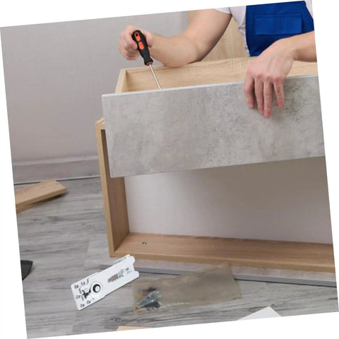Person installing Heavy Duty Sectional Sofa Connector Brackets For Couches And Modular Furniture With Solid Steel Fasteners.