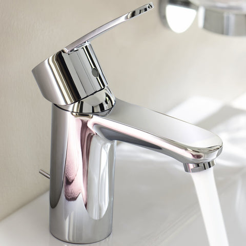 Cosmopolitan Centerset Bathroom Faucet With SilkMove Handle Starlight Finish EcoJoy Water Saving Tech For A No Fuss Quick Install Low Arc Single Hole 1.5 GPM displayed in a modern chrome design with water flowing