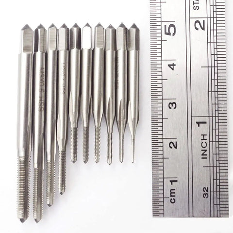 10 Piece Micro Tap Drill Bit Set M1 To M3.5 Metric Thread Bits Kit HSS High Speed Steel next to a ruler for size comparison