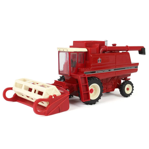 International Harvester 1460 Combine Die Cast Model One Sixty Fourth Scale with corn head, showcasing rear wheel assist feature.