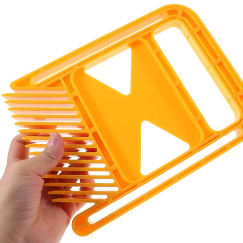 Boss Level Extended Featherboard Safety Guard Table Saw Accessory keeps stock locked down against fence, heavy-duty yellow plastic tool.