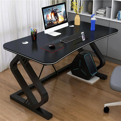 Game Ready Multifunctional Computer Desk With Built In Phone And Drink Slots curved gaming table, matte black, 63 inches wide, modern workspace.