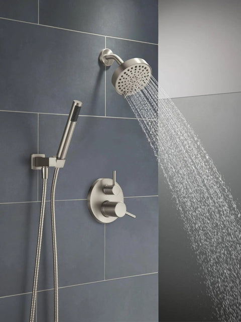 Slick Brushed Nickel Shower System Valve Trim Kit Featuring A Badass 6 Inch Rainfall Head and wall mount handheld in a modern bathroom.
